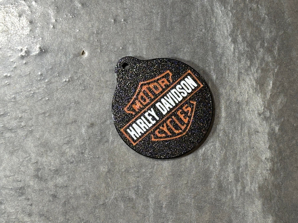 Batch of 3D printed logo soda toppers