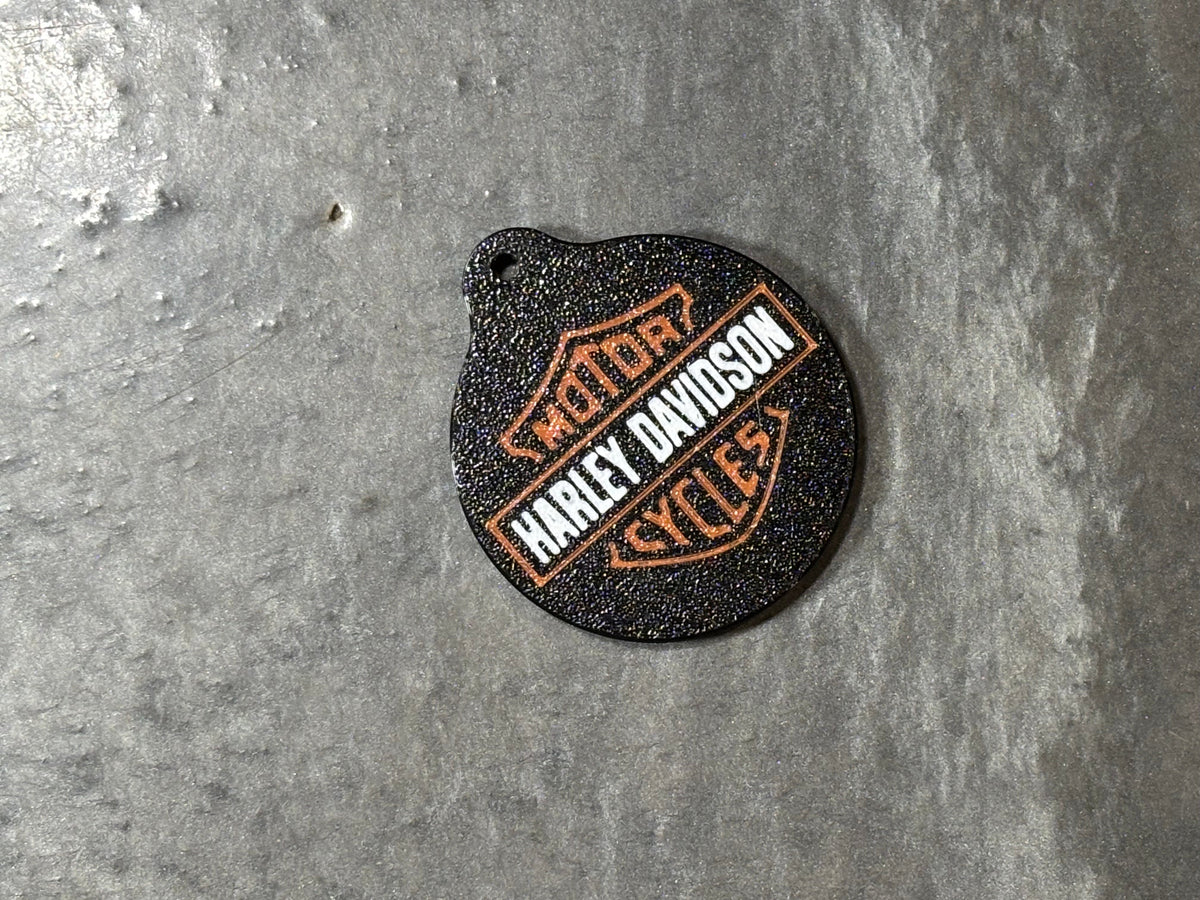 Batch of 3D printed logo soda toppers